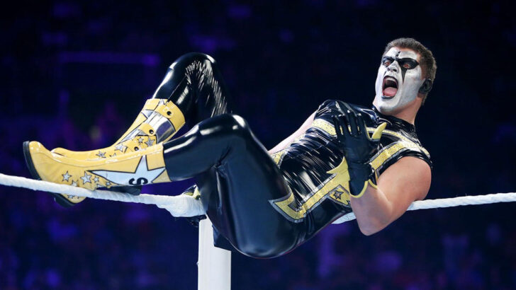 Cody Rhodes as Stardust lying on the top ring rope in the corner