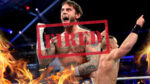 CM Punk In The Ring with John Cena, with a stamp saying "You're Fired" over him and flames framing the image