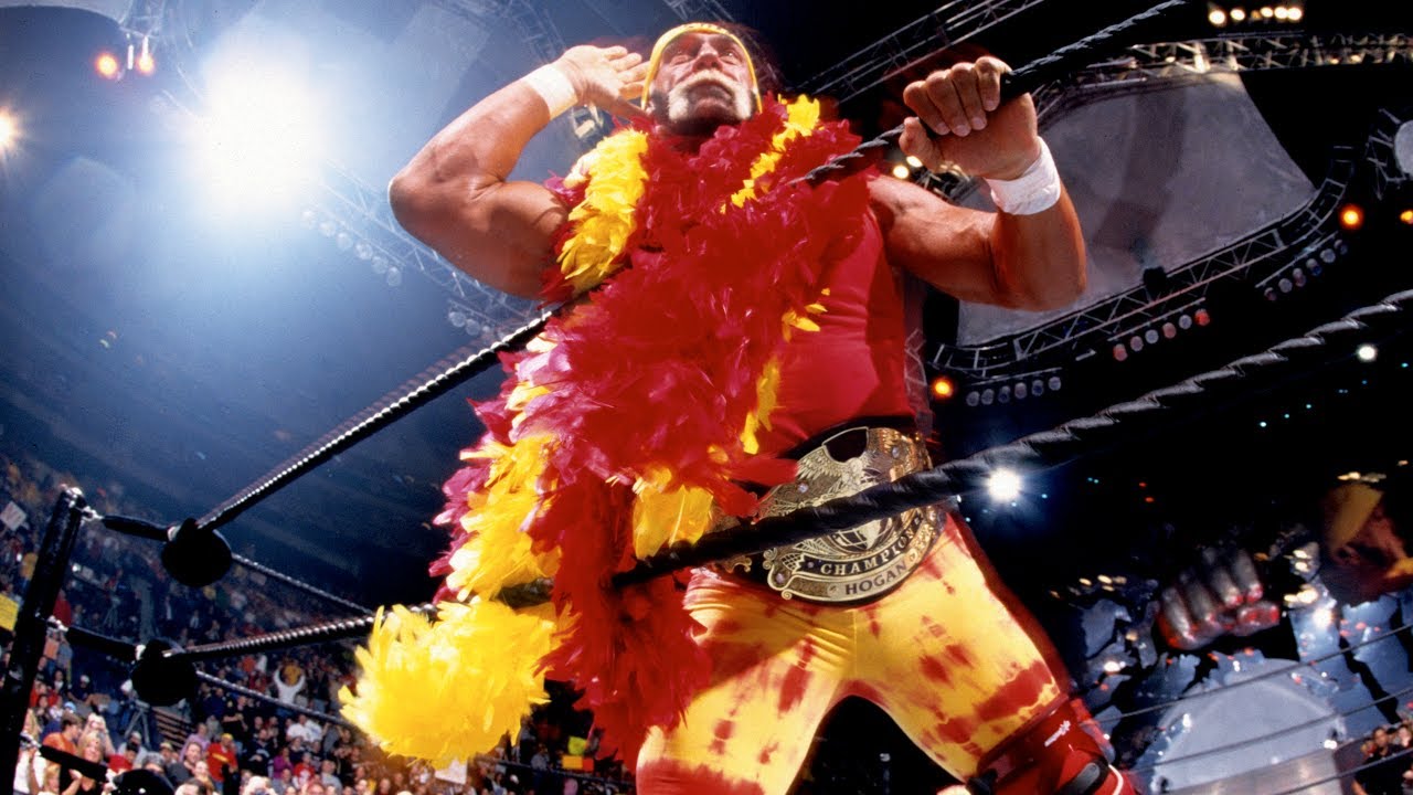 Hulk Hogan celebrates with the WWE Undisputed Championship