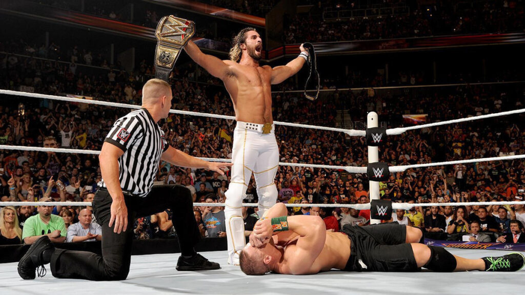Seth Rollins stands over John Cena as WWE and United States Champion