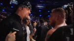 The Undertaker confronts Brock Lesnar at UFC 121