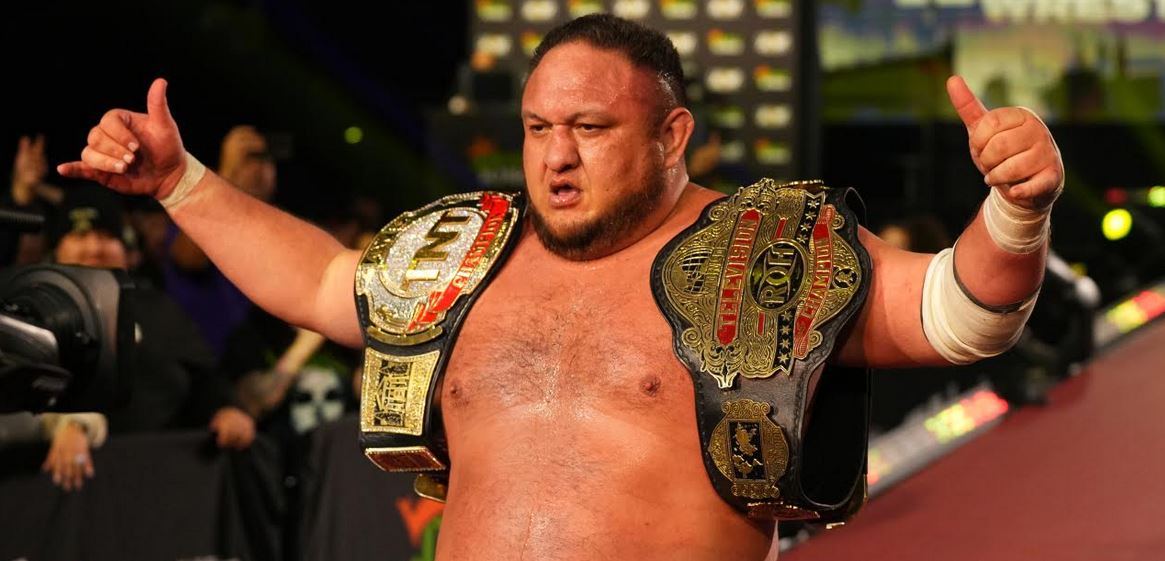 Samoa Joe celebrates as the TNT and ROH Television Champion