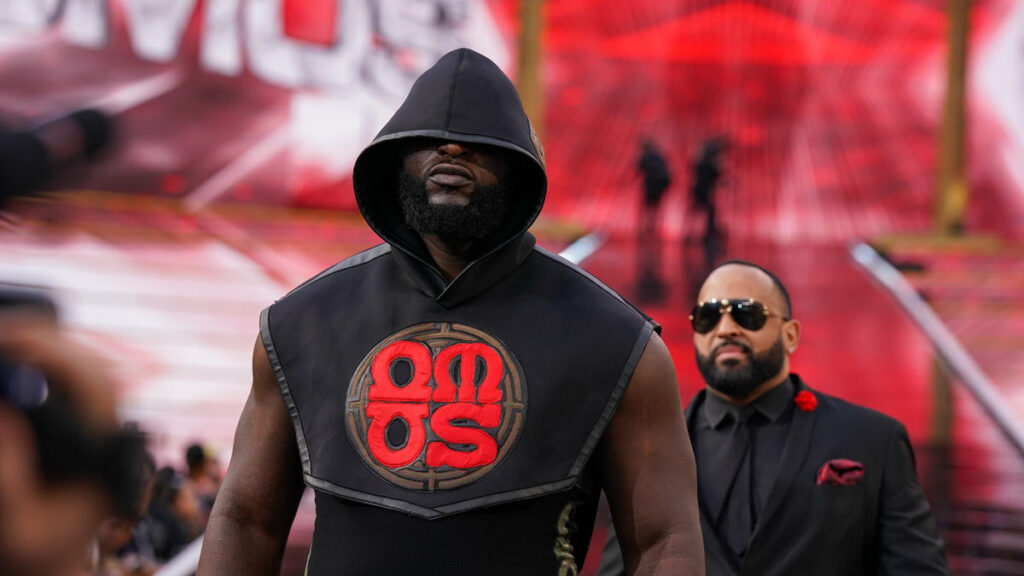Omos with MVP at WrestleMania 39 before his match vs Brock Lesnar